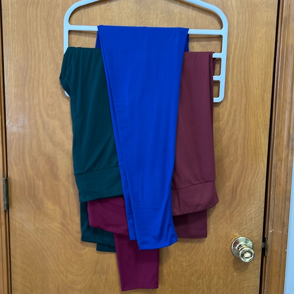 4 pairs of LulaRoe TC leggings (blue, dark pink, burgundy and dark green)